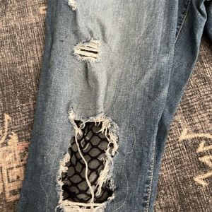 Distressed fishnet insert Torrid jeans!